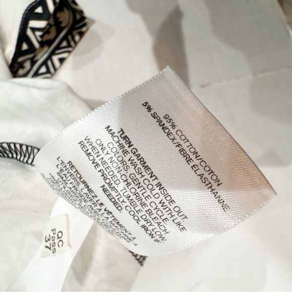 Express Aztec print plunge neck empire waist mini dress built in shorts! ❤️ - Picture 6 of 6